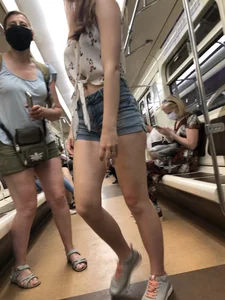 Cute And Slightly Awkward Tall Teen Girl in a Top and Denim Shorts Subway Train Candid Photos