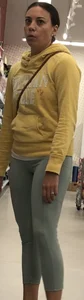 Brunette milf in light colored leggings