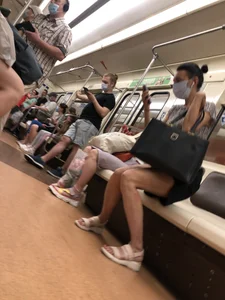Candid Girl With Hot Long Legs in Shorts And Sandals Subway Train Creepshots Gallery
