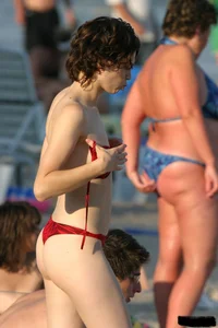 Beach voyeur girls in bikinis, thongs and topless