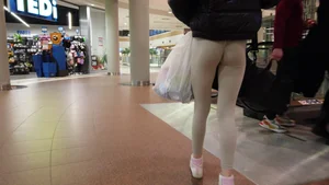 Very tight ass of slim T in grey leggings