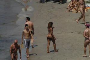 Girls on a nude beach in Sitges, Spain