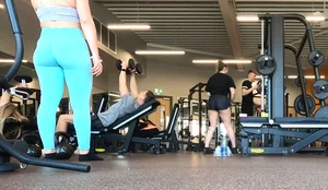 Gym blonde in turquoise leggings notices me and doesn’t mind, even moves in front of me later for some close-ups