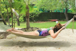 Skinny Girl in Panties Lying in Hammock