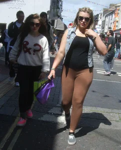 Thick blonde showing her panties in see through leggings