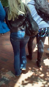 Blonde in tight jeans with her red thong sticking out