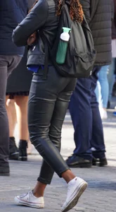 Black babe out in tight shiny pants with slight vpl