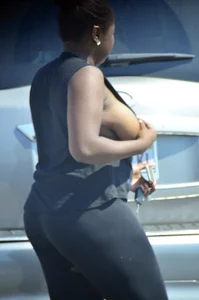Chubby black lady with big tits and no bra lets it slip