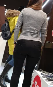 Big booty employee in tight black jeans with slight vpl
