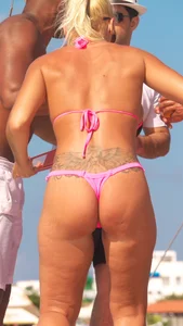 Big booty blonde babes on the beach in little thong bikinis