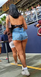 Latina MILF in orange leggings plus booty shorts