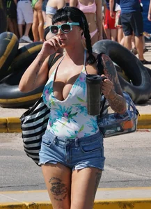 Girls in bikinis getting ready for tubing