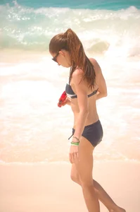 Bunch of sexy girls and milfs in bikinis at the beach
