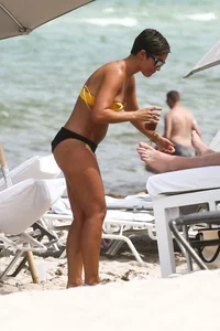 Frankie Bridge nip slips in a bikini on the beach
