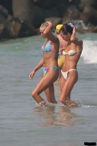 A bunch of sexy beach voyeur babes in bikinis, thongs and topless