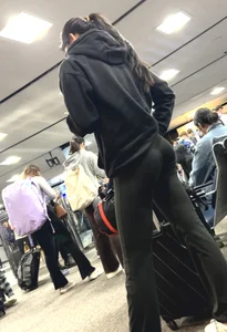 Tight asian lifts up short to show off booty to me at airport
