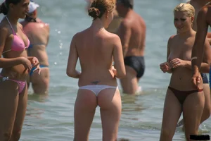 Sexy candid topless and nude beach girls