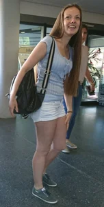 Pretty blonde babe with nice legs in white denim shorts