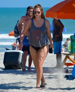 Chubby white girls in bikinis on the beach