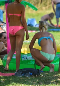 Various sexy girls in bikinis at the park