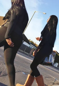 2 sexy black girls in leggings with nice asses