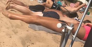 Swedish beach babe in pink and black bikini