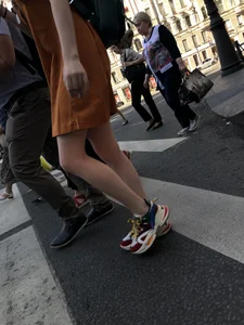 Cute Teen Girl in a Dress With Slim Legs Standing in the Subway Train, Then Crossing the Street Photo Gallery