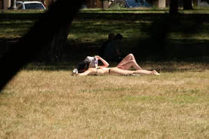 Creepshots of some girls in the park getting some sun in bikinis