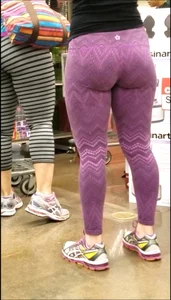 Thick Blonde in purple leggings