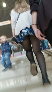 Girl in Black Pantyhose and a Skirt Stairs Candid Upskirt