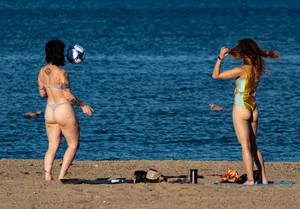 Ladies literally making out on beach