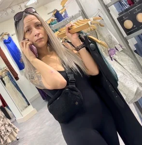 Perfect fat ass in a slutty outfit with tramp stamp showing!