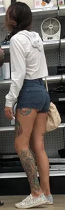 Slim tatted succubus in cheeky jean shorts
