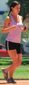 Hot brunette running in short shorts with vpl