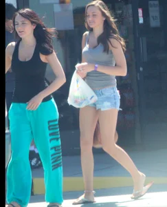 Beautiful tall teen in short denim shorts