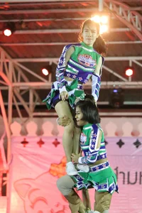 Bunch of athletic Thai cheerleaders at a competition