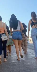 super sexy denim short shorts on this brunette with tremendous legs and big butt