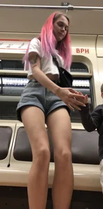 Girl With Pink Hair and Hot Legs in Denim Shorts in the Subway Train Candid Photo Gallery