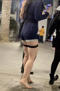 Asian baddie with great legs, heels and Cop costume