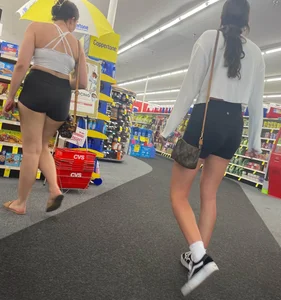College girls at CVS with black yoga shirts and white tops
