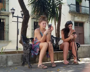 Nice legs and feet in the park (one of them showing little else)