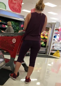 Blonde bubble butt babe shopping in tight purple leggings