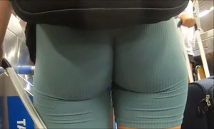 Candid hottie with a sexy ass and wedgie in tight teal biker shorts