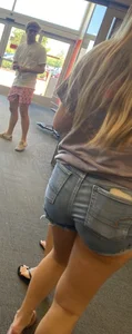 Four college teens in short shorts
