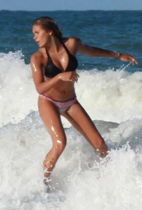 Hot surfer chicks out in the water