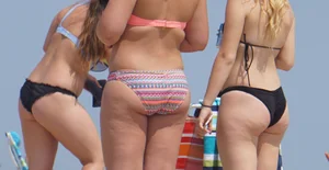 Thick girl on the beach in a bikini