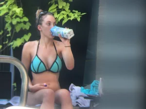 Hot girl at the pool in her bikini with big tits
