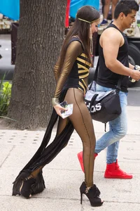 Sexy brunette in hot costume outfit