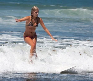 Candid surfer babes on the beach and in bikinis