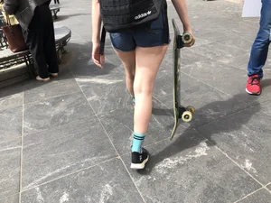 Hot chunky skater girl wearing denim shorts